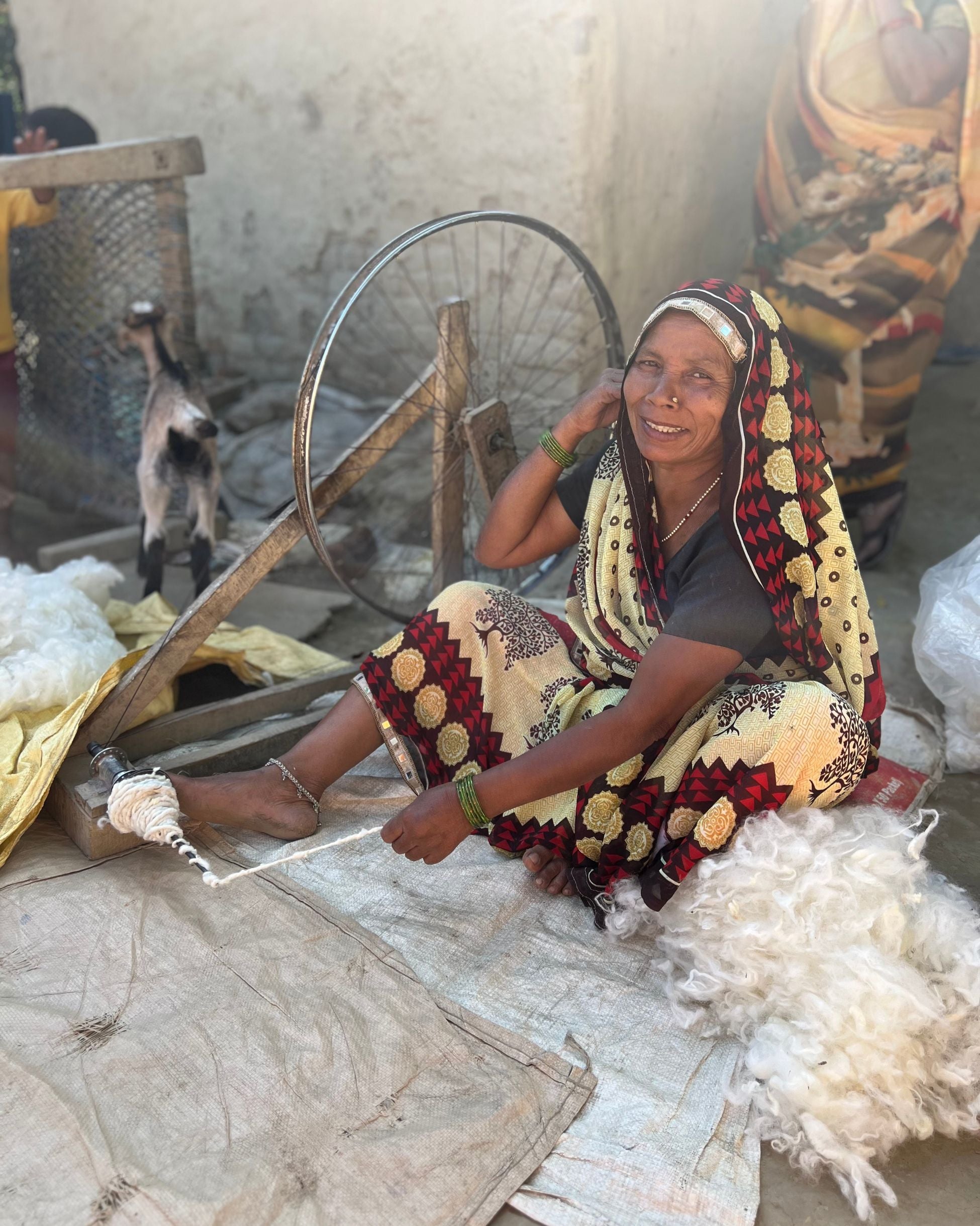 Spinning wool in India